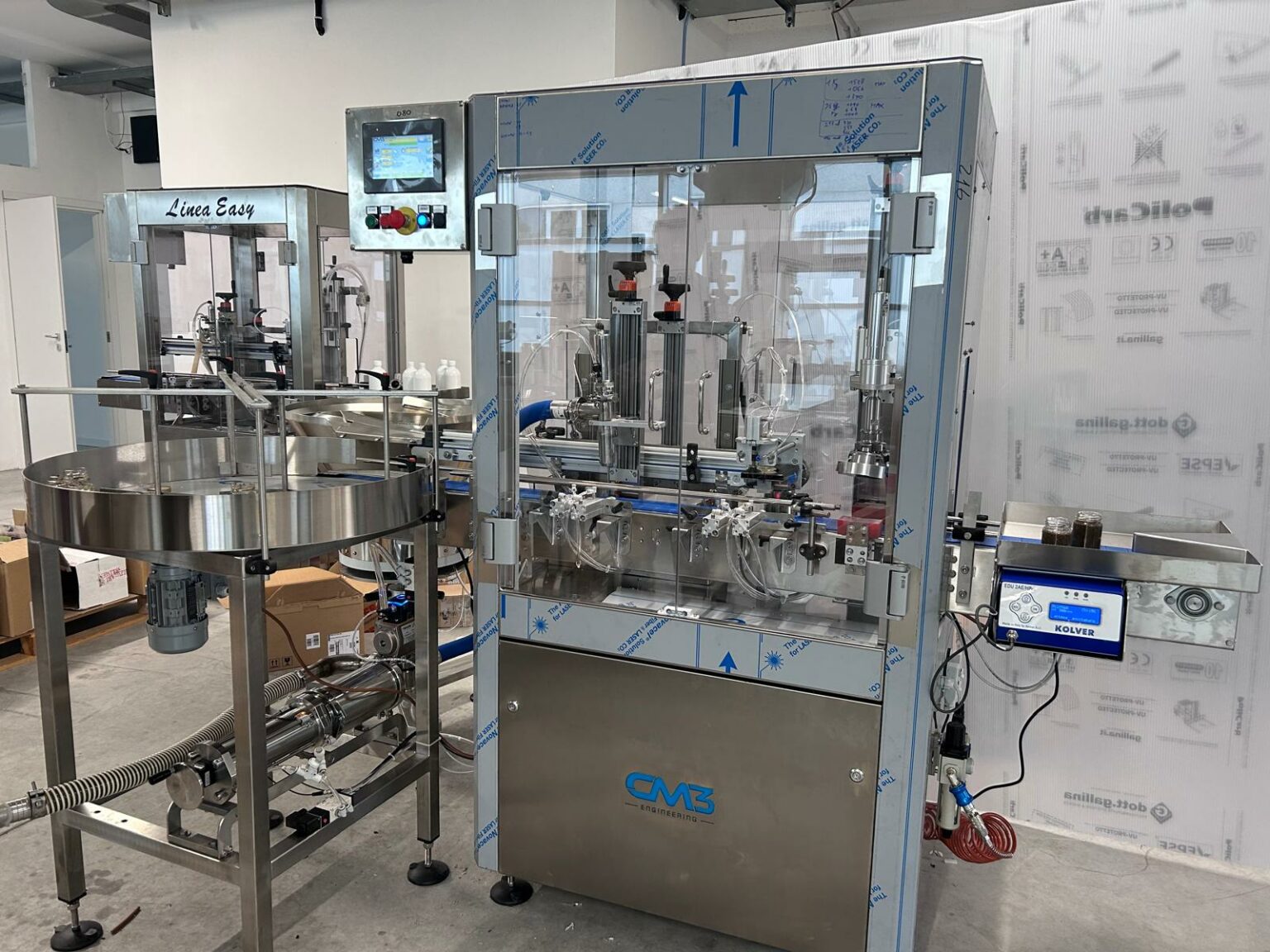 Automatic filling and capping line for food sauces - CM3 Engineering